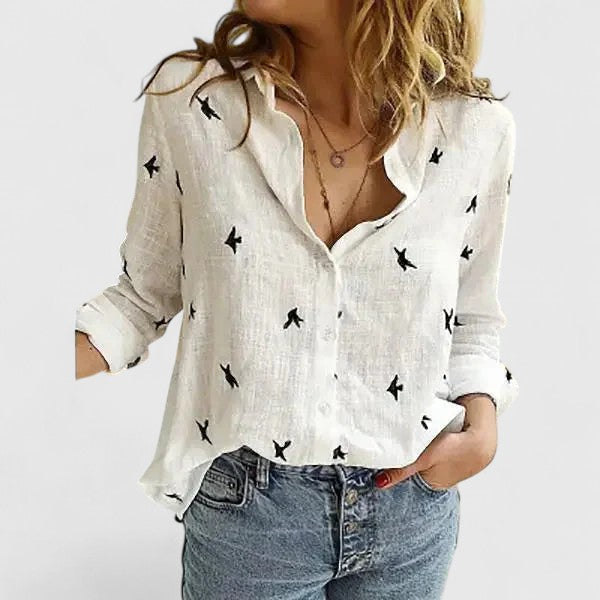 Women's elegant floral V-neck long sleeve blouse, a chic spring top for office wear.