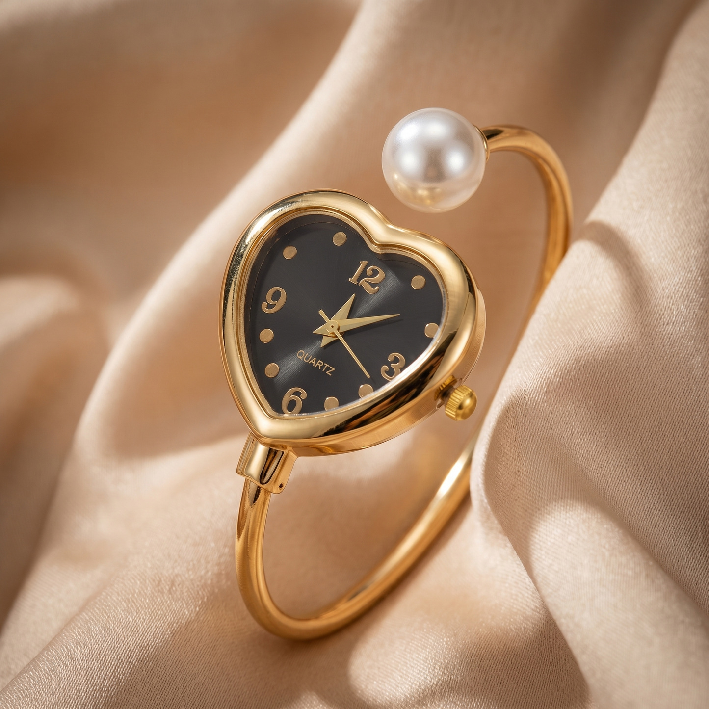 Women's quartz watch: gold bracelet, modern pearl details, and a sweet heart charm. Stylish & accurate.