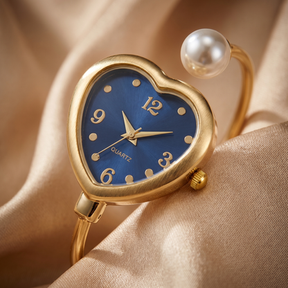 Modern fashion watch for women: gold bracelet, exquisite pearl accents, and a distinctive heart design.