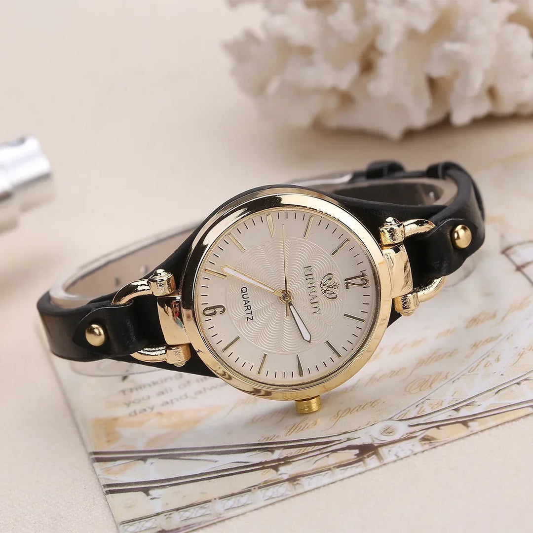 Stylish women's elegant gold quartz watch, a perfect fashion accessory gift with a vegan leather strap.