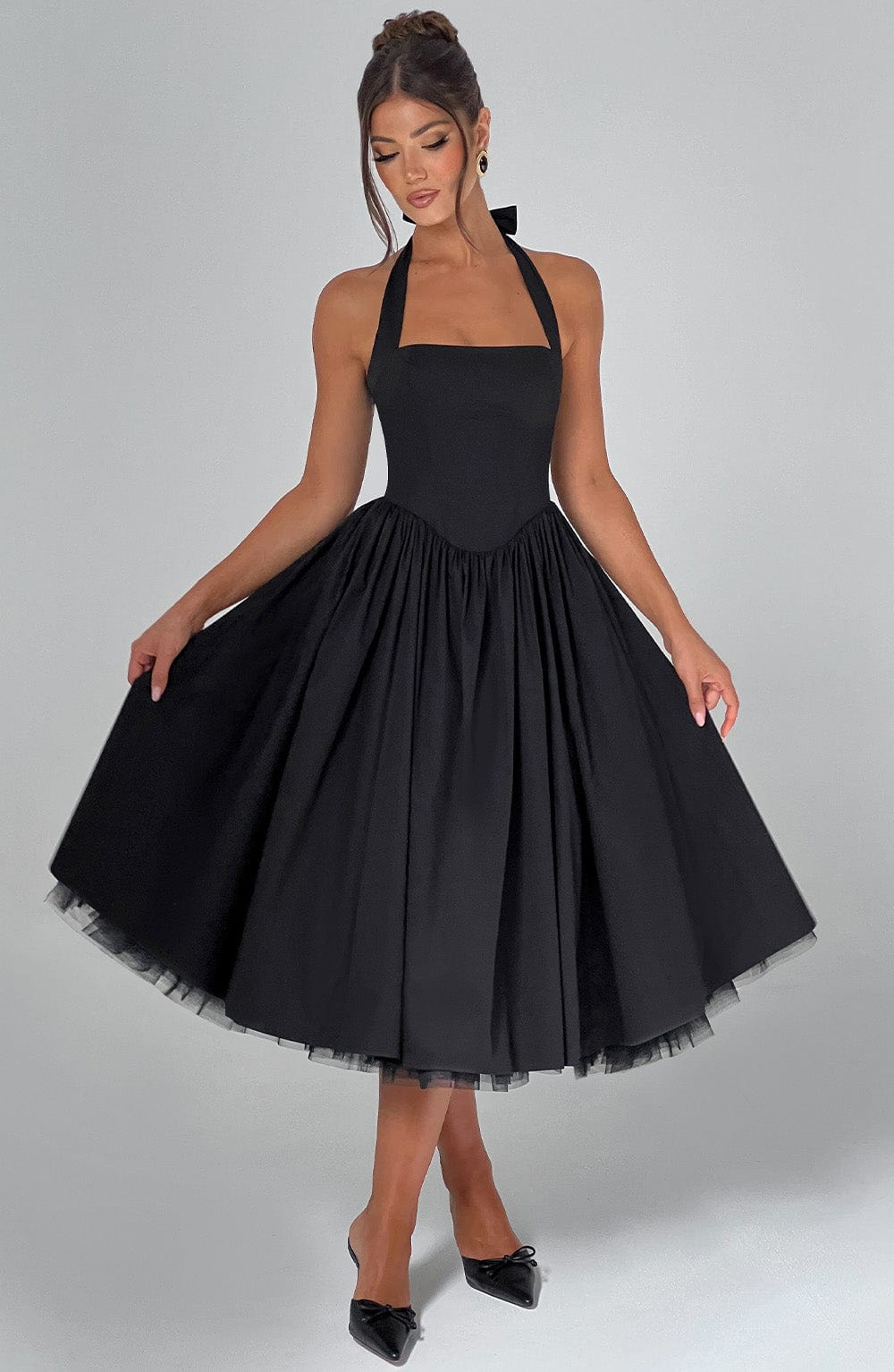 Vintage style ladies halter neck midi dress, a timeless choice for formal events and special occasions.