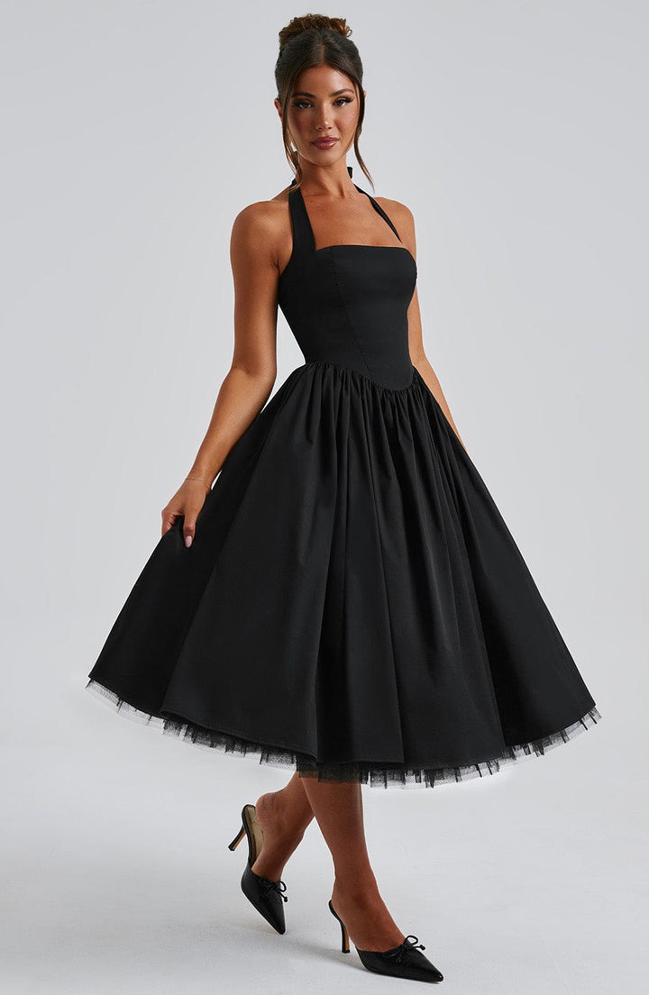Women's formal halter neck midi dress, a chic option for special occasions and party wear.
