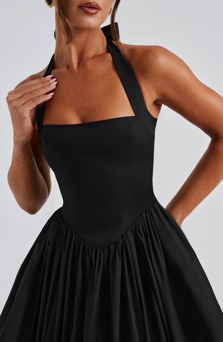Timeless women's halter neck midi dress, a sophisticated choice for formal and party wear.