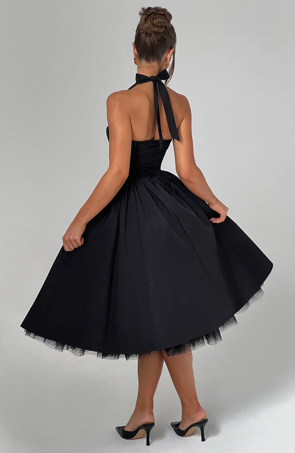 Ladies' elegant halter neck midi cocktail dress, ideal for special occasion evening wear.