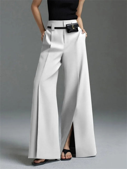 Women's elegant high-waisted wide-leg pants with stylish front slits. Versatile for office or casual chic.