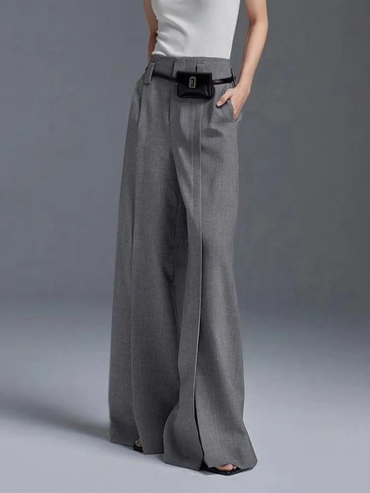 Fashionable women's wide-leg trousers, high-waisted design with airy leg slits. Great for summer style & comfort.