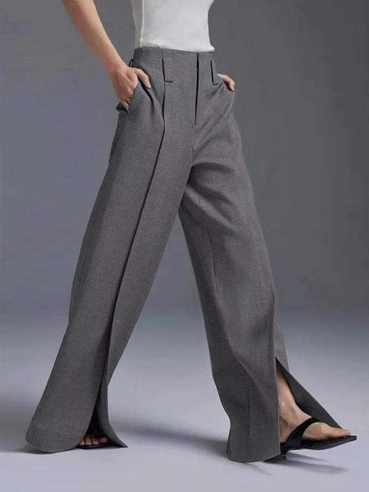 Modern women's high-waisted wide-leg pants with stylish leg slits, offering a sleek and versatile silhouette.
