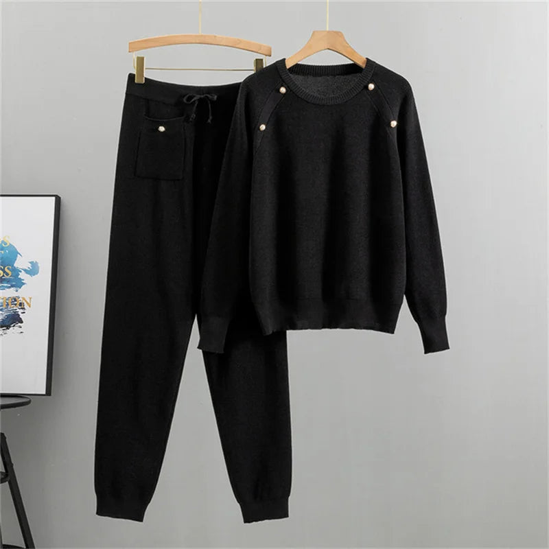 Women's elegant knit lounge set with pearl embellishments. Comfortable two-piece sweater & jogger for casual fall/winter wear.