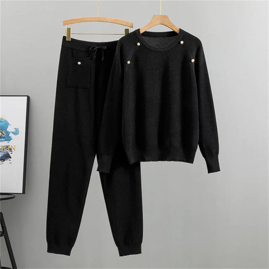 Women's elegant knit lounge set with pearl embellishments. Comfortable two-piece sweater & jogger for casual fall/winter wear.