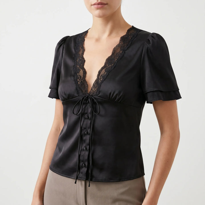 Versatile women's solid color blouse with delicate lace trim & short sleeves; an elegant, feminine day-to-night top.