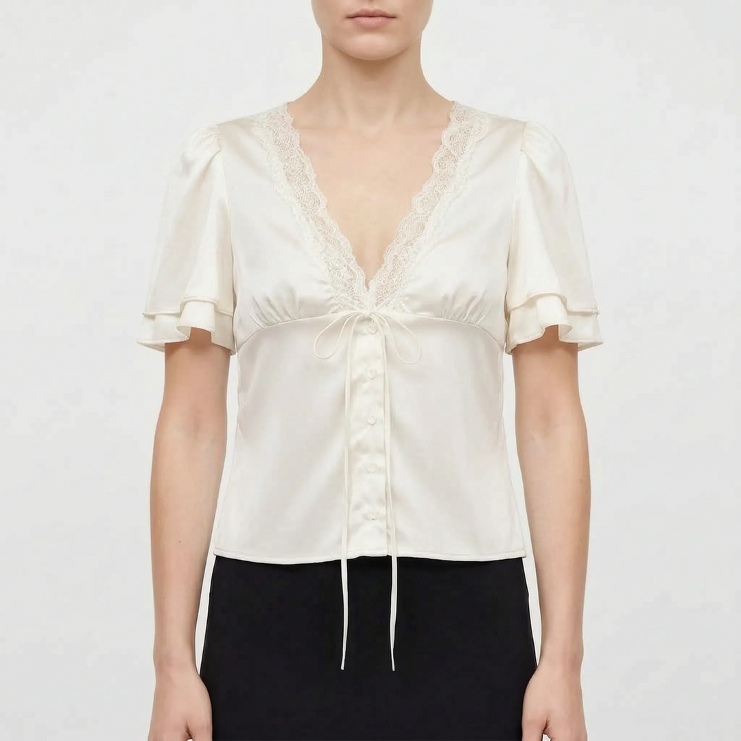 Feminine women's elegant blouse with lace trim & short sleeves; a versatile day-to-night top for casual chic style.