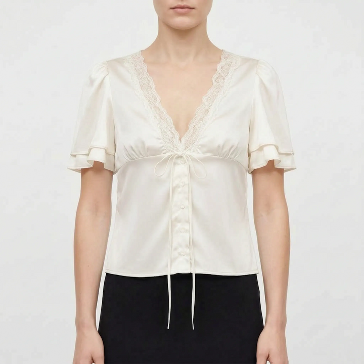 Feminine women's elegant blouse with lace trim & short sleeves; a versatile day-to-night top for casual chic style.