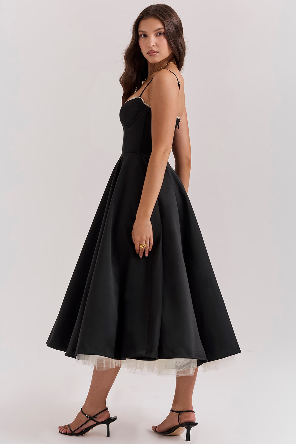 Unique women's midi dress combining a corset bodice, sweetheart neckline, elegant lace trim, and functional pockets.