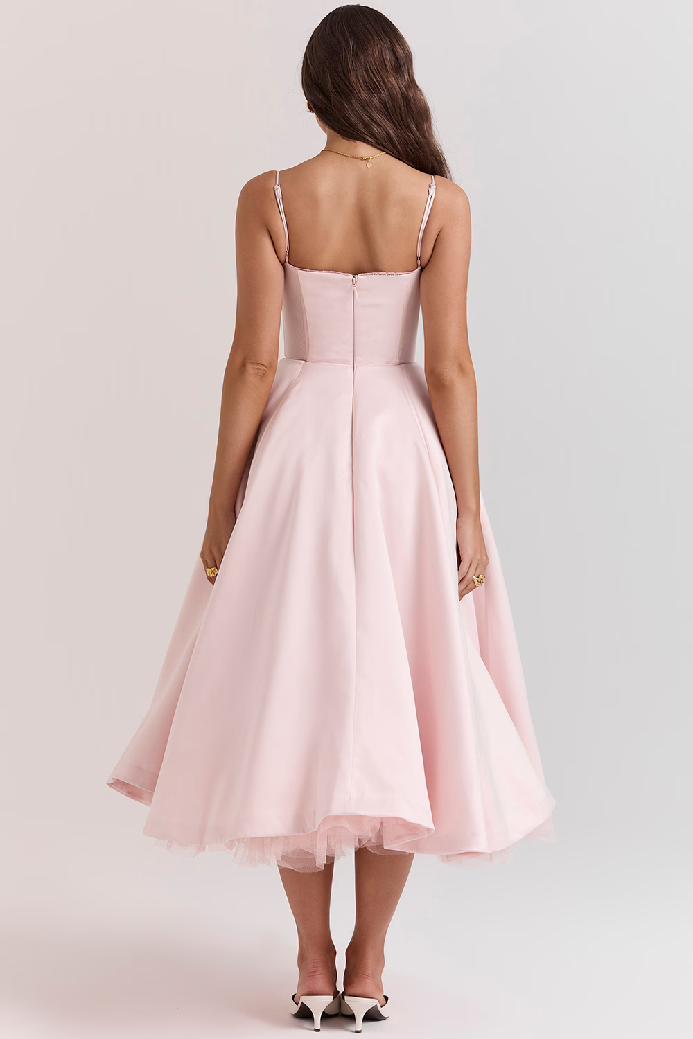 Beautiful summer evening midi dress, sleeveless with a corset top, delicate lace trim, and pockets for women.