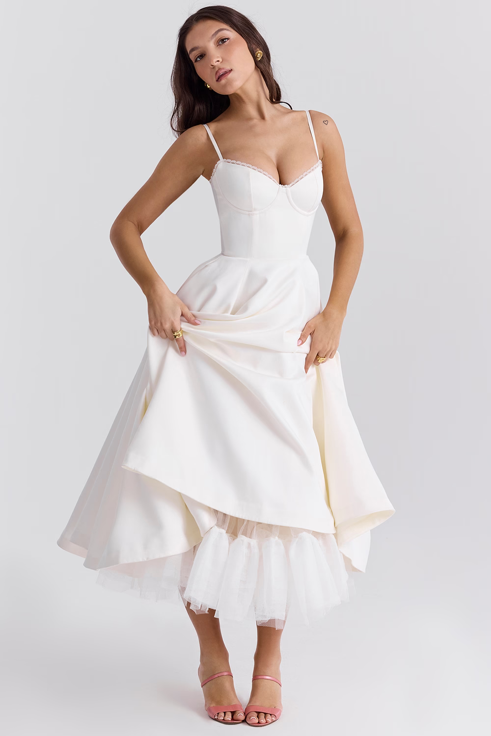Stunning cocktail party midi dress with a chic corset bodice, sweetheart neckline, elegant lace, and pockets.