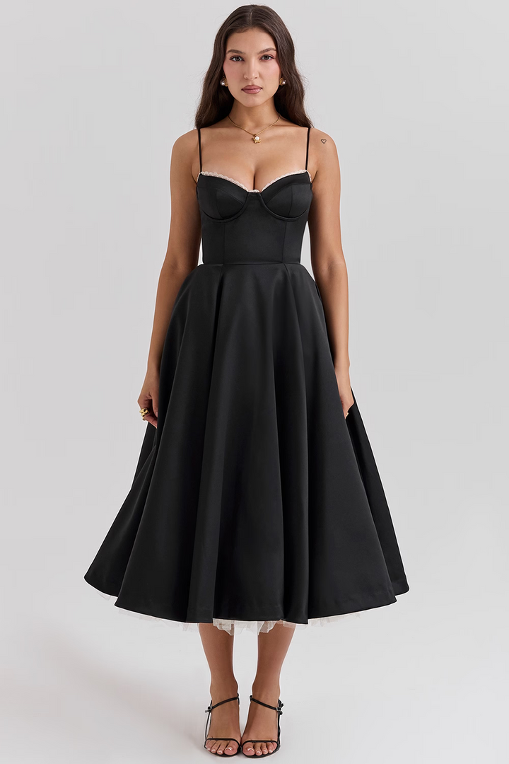 Full view of a women's elegant midi dress with corset bodice, lace trim, sweetheart neckline, and practical pockets.