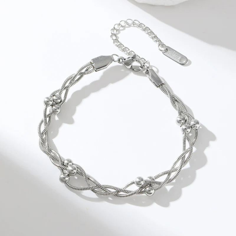Women's layered chain bracelet, an elegant and trendy fashion accessory for any outfit.