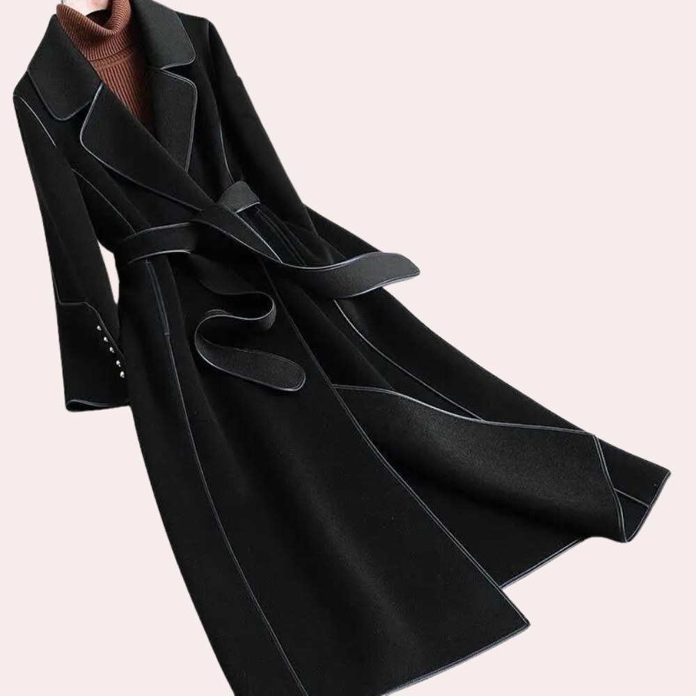 Women's elegant long coat with double-button closure and belted waist for versatile formal or casual style.