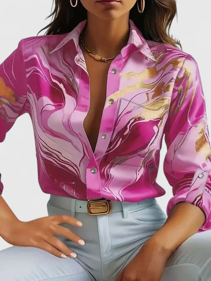 Sophisticated women's blouse with long sleeves, offering both elegance and comfort for various occasions.