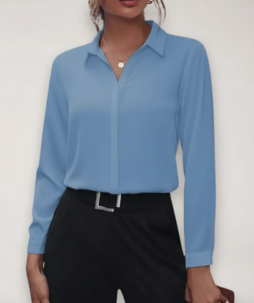 Elegant women's white blouse, perfect as a professional top for office attire or formal women's clothing.