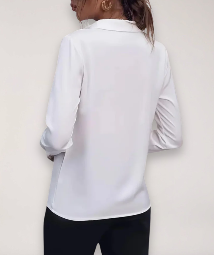 Chic women's button-down blouse, an elegant choice for professional work fashion and stylish office wear.