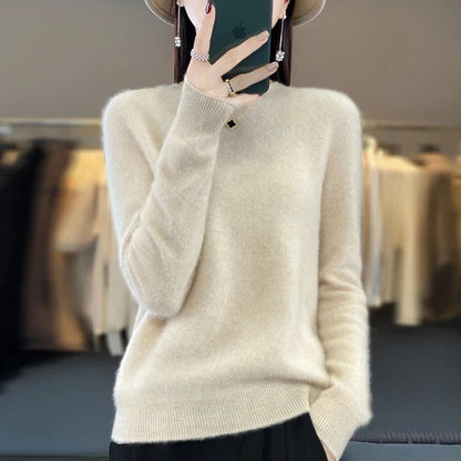 Elegant o-neck women's long sleeve sweater. Classic style, slim fit. Sophisticated autumn fashion & warm winter apparel.