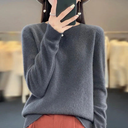 Slim fit women's long sleeve sweater, elegant & cozy. Versatile top for classic style autumn fashion & everyday comfort.