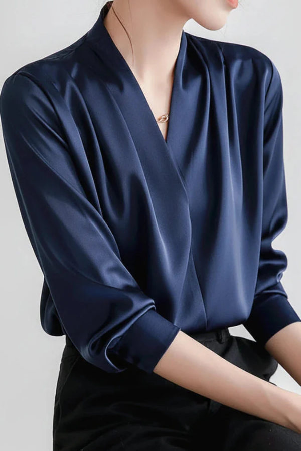 Elegant & comfortable women's wrap top. A versatile long sleeve blouse suitable for office and everyday style.