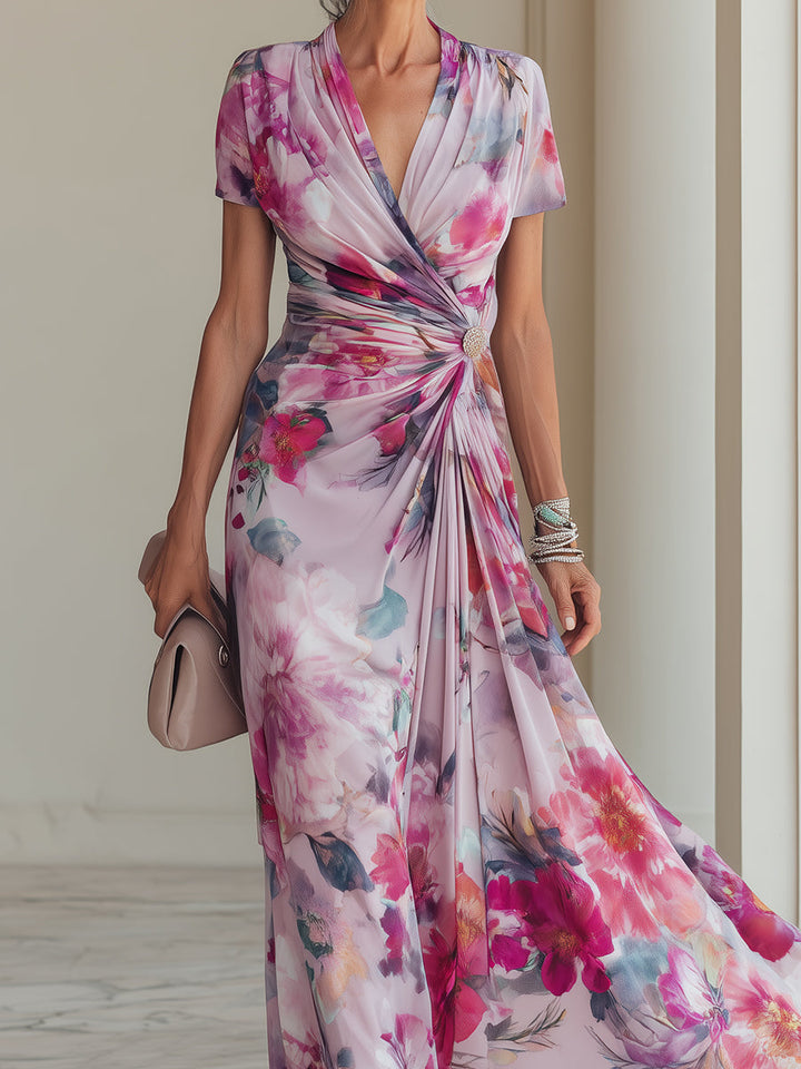 Formal magenta floral wrap maxi dress, perfect as a wedding guest or elegant occasion wear, with V-neck and ruched details.