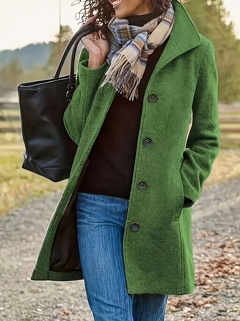 Sophisticated women's trench coat, mid-length, with prominent lapel & classic button-front for autumn style.