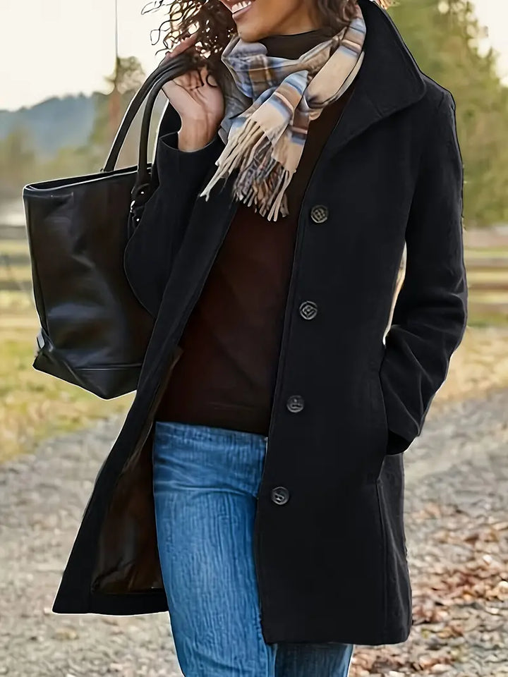 Stylish women's button-front trench coat with elegant lapels, perfect mid-length outerwear for fall & winter fashion.