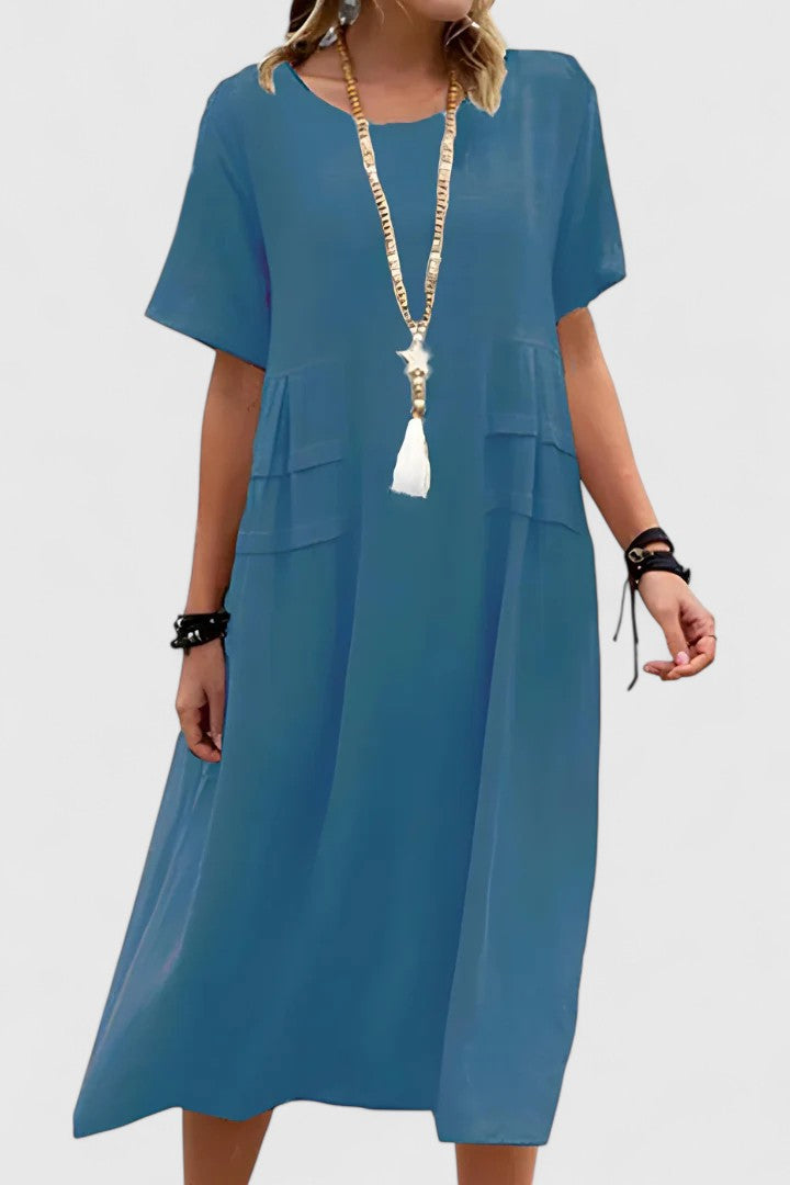 Blue elegant women's midi dress with a flattering fit, perfect for versatile styling from casual day to sophisticated evening.