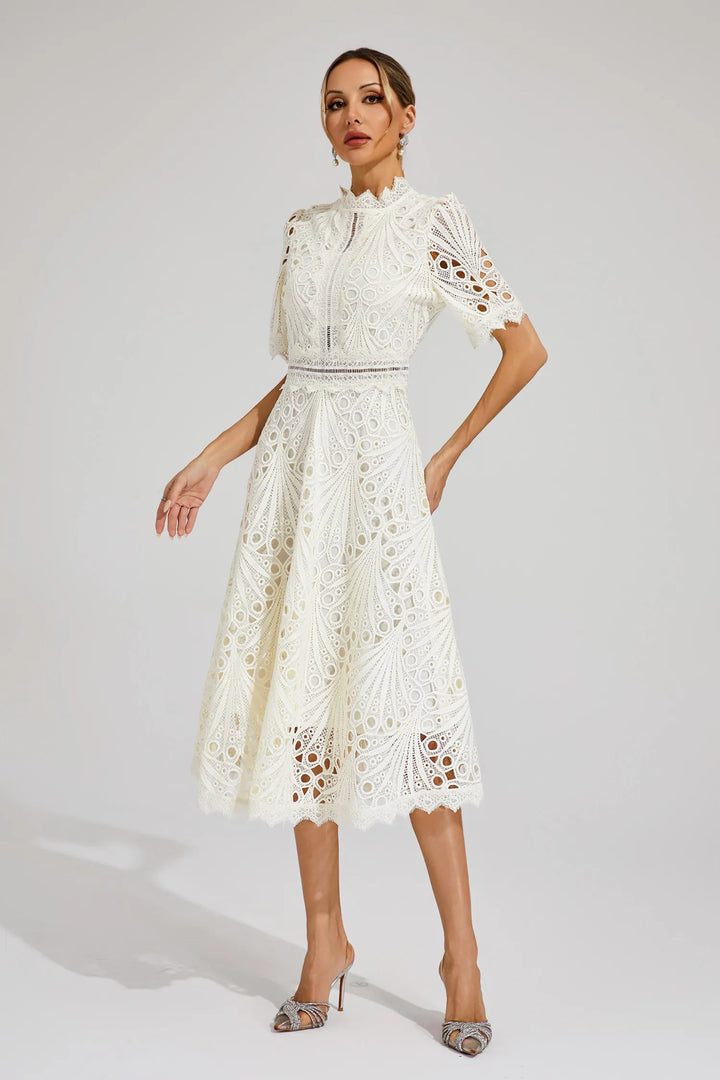 Tailored women's elegant midi dress, designed for special occasion parties and chic spring wedding guest attire.