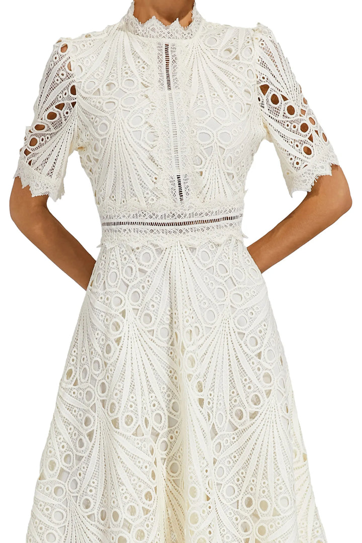 Women's elegant wedding guest midi dress, tailored for a sophisticated look at spring & summer special occasions.