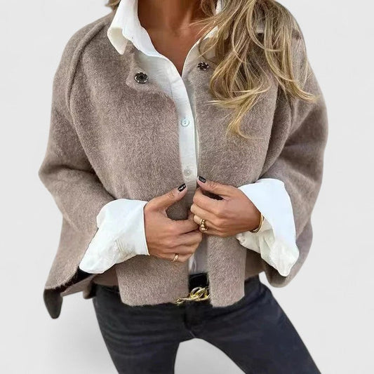 Women's elegant open-front jacket, stylish and versatile for any occasion.