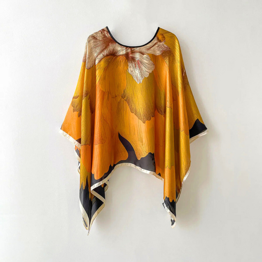Women's elegant patterned shawl, a versatile and stylish fashion accessory for adding a chic touch to any outfit.