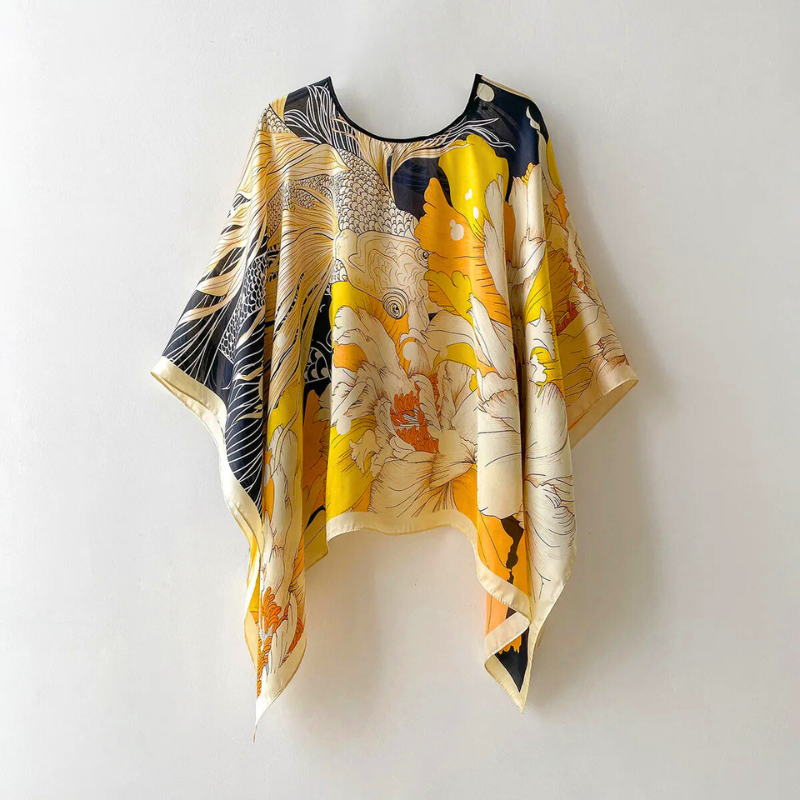 Lightweight women's patterned shawl, an elegant and versatile accessory for all seasons. A stylish fashion statement.