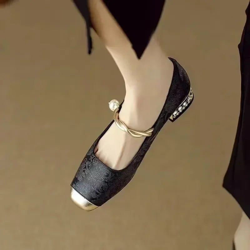 Stylish slip-on women's pearl flats, perfect for office wear or evening events, with a comfortable fit.