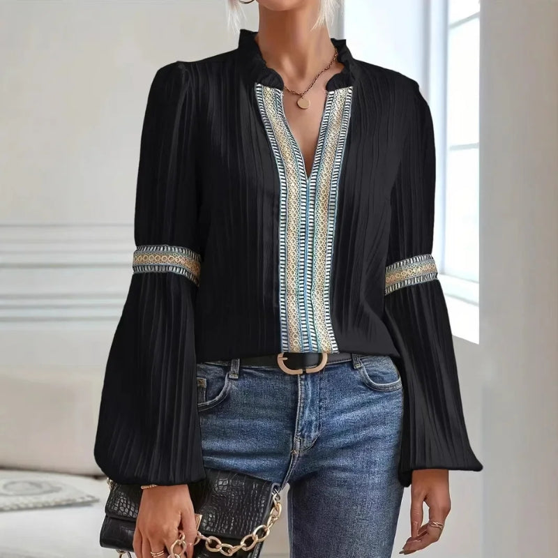 Sophisticated women's top: a pleated shirt with delicate lace trim and elegant flared sleeves for a stylish look.