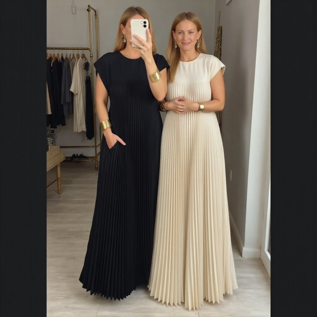 Summer-ready pleated maxi dress for women, boasting a flowing design and comfortable elegant fit.