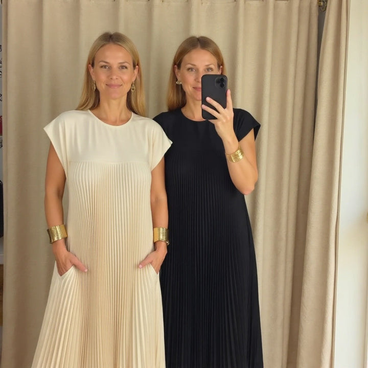 Elegant flowing pleated maxi dress for women, a versatile piece for summer parties or special occasions.