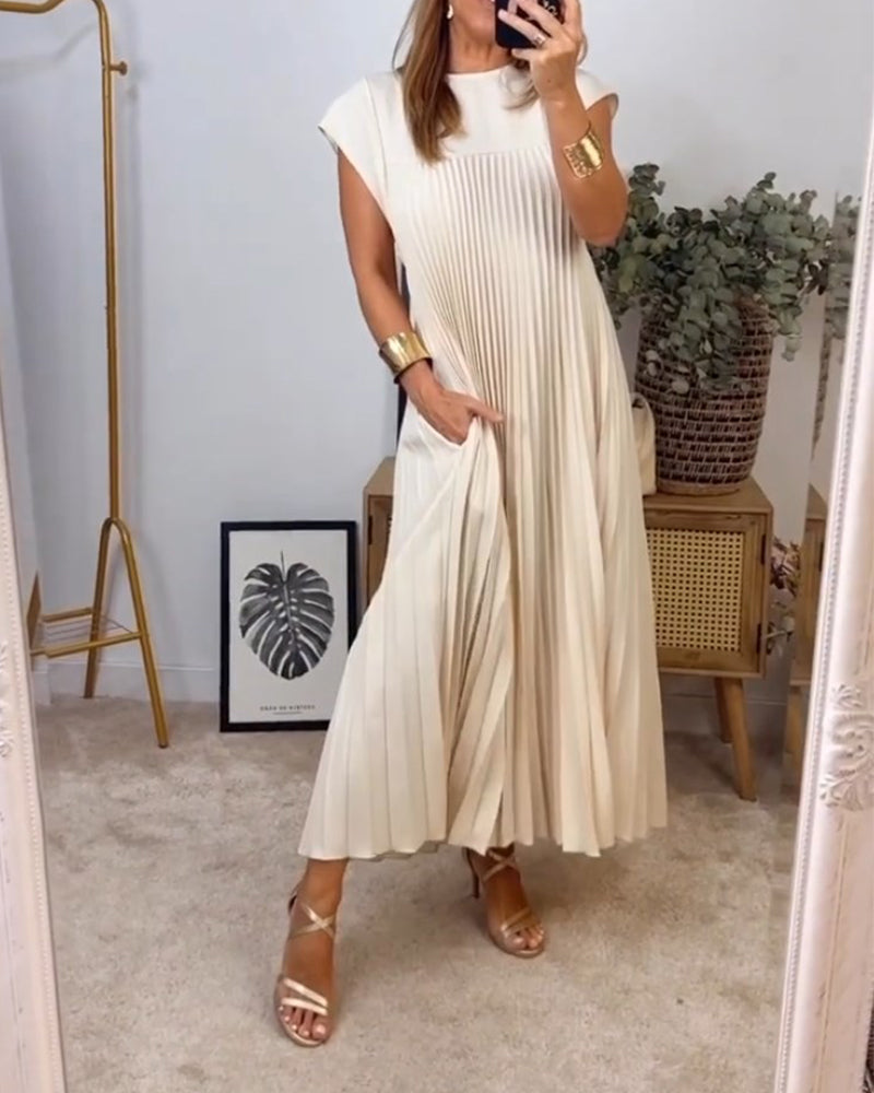 Stylish women's long pleated dress, a versatile flowing maxi perfect for an elegant summer wardrobe.