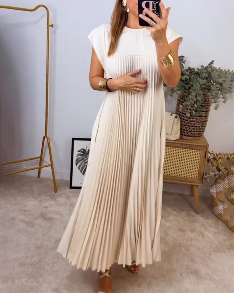 Occasion-ready women's pleated maxi dress, featuring a luxurious flowing design and comfortable fit.