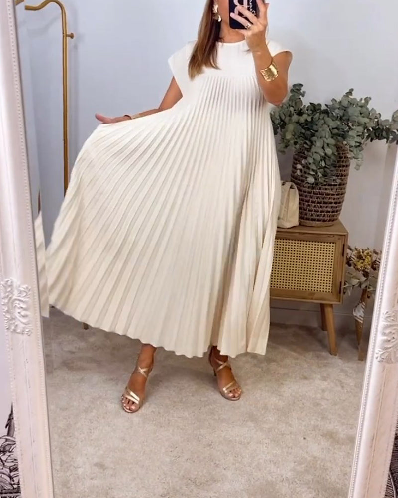 Sophisticated women's flowing pleated maxi dress, offering elegant style and versatile comfort.