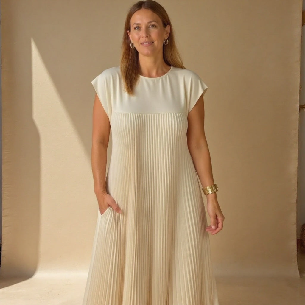 Comfortable long pleated dress for women, featuring a beautiful flowing design perfect for any event.