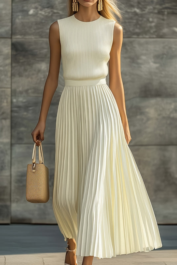 Women's elegant pleated midi dress in a flowy fabric, perfect for summer vacations or chic casual wear. Sleeveless design.