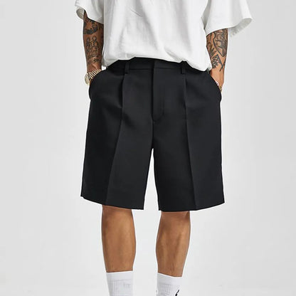 Women's elegant pleated shorts with a high-waist, perfect for sophisticated summer style and chic apparel.