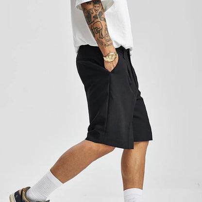 Stylish high-waist pleated shorts for women, offering a chic and elegant look for warm weather fashion.