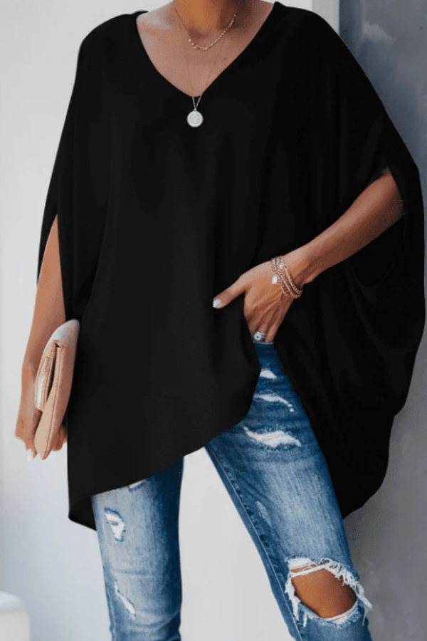Vibrant rainbow pleated V-neck blouse for women. Elegant spring fashion, versatile for day or work.