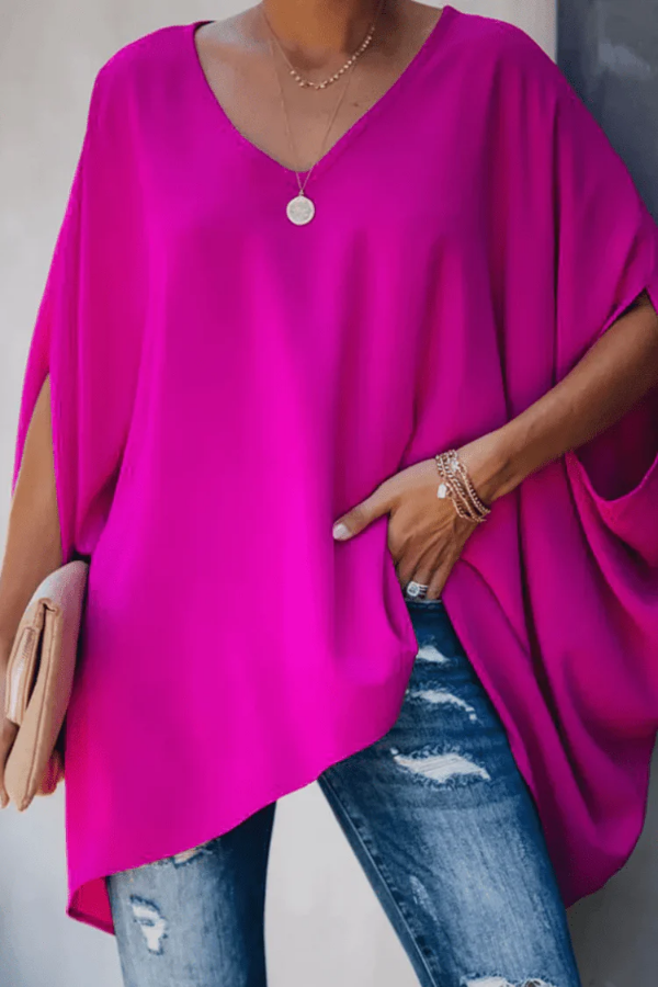 Chic black women's pleated V-neck blouse, ideal for elegant spring fashion or versatile workwear.